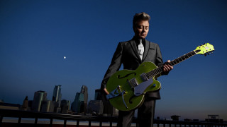 Man suit green guitar city - a man in a suit holding free wallpaper