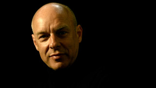 Bald man black shirt serious - hypermodernism free wallpaper for desktop