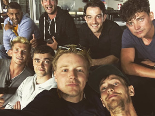 Men sitting room wall beard - a group of men sitting next free wallpaper