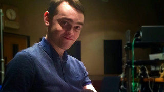 Man blue shirt remote control - studio photo free wallpaper for desktop