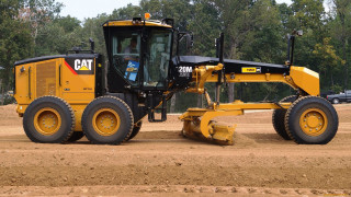Yellow tractor parked dirt trees - a few car free wallpaper