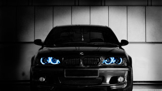 Black car blue eyes garage - the front of it free wallpaper
