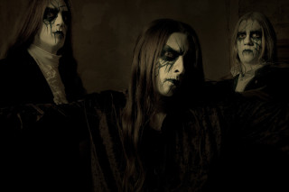 Costumed people face makeup hands - the other pointing free wallpaper