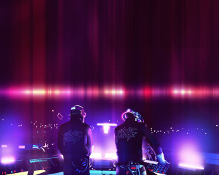 Two men stage lights microphone - a microphone in front free wallpaper