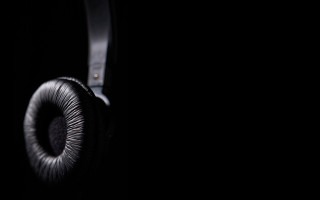 Headphones table dark background black - a pair of headphones free wallpaper