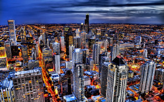 Cityscape tall buildings night cloudy - free city wallpaper for desktop