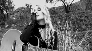 Woman long hair holding guitar - photo free wallpaper