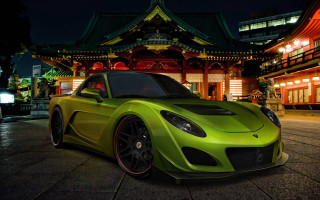 Green sports car night building 2 - a green sports car free wallpaper