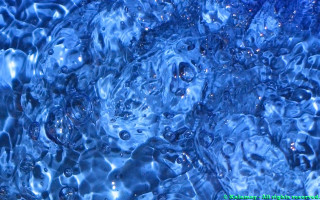 Blue background water bubbles surface - a green border free wallpaper