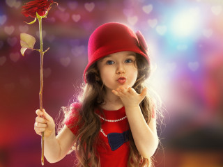 Little girl holding rose red - a rose free wallpaper