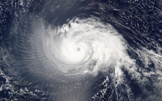 Satellite hurricane ocean white circle - a white circle in the center of the image free wallpaper