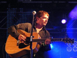 Man playing guitar concert stage 2 - a microphone free wallpaper