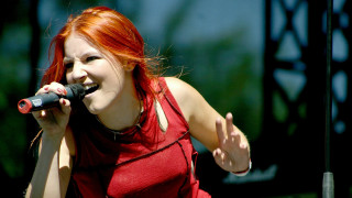 Woman red hair singing microphone 2 - her hand and a microphone free wallpaper for desktop