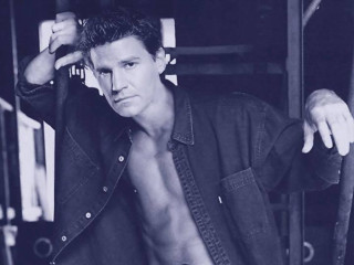 Man no shirt leaning wall - against a wall free wallpaper for desktop