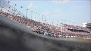 Race track cars crowd stands 2 - a crowd of people watching free wallpaper