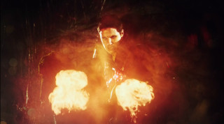 Man holding fireballs serious look - brian fies free wallpaper for desktop