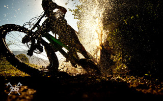 Bike puddle sunny woods impressionist - a person riding free wallpaper