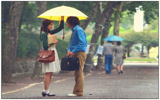 Man woman umbrella rain briefcases - movie still free wallpaper