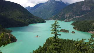 Lake mountains trees boats daytime - the middle of the day free wallpaper