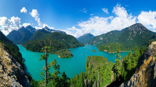 Lake mountains trees sunny blue - blue water free wallpaper