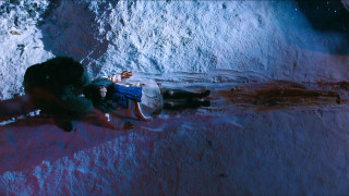 Man laying snow pile snowboard - a snowboard free wallpaper for desktop