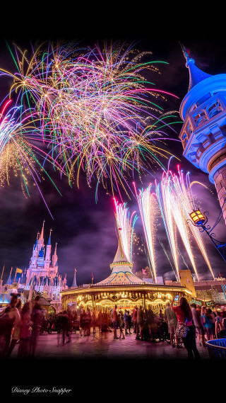 Fireworks castle night people carousel - free new year wallpaper for mobile