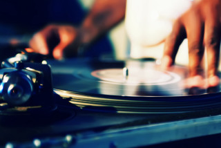 Person playing record turntable dj - a record free wallpaper
