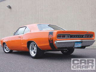 Orange car parked building license 2 - an orange car free wallpaper