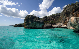 Rocky cliff water cliff face 2 - a rocky cliff free wallpaper