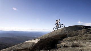 Man riding bike rocky mountain 2 - a bike free wallpaper for desktop