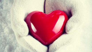 Person holding red heart snow - their hands in free wallpaper