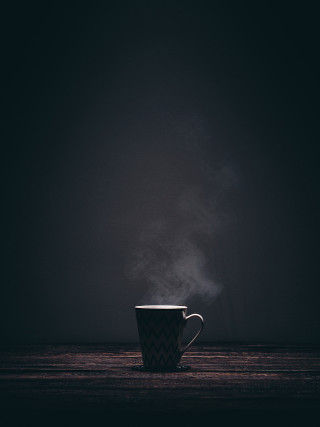 Steaming cup coffee table dark - free minimalism wallpaper