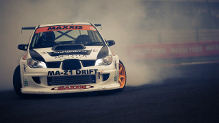 White car race track smoke - a race track free wallpaper