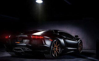 Black sports car dark room 31 - a spotlight free wallpaper