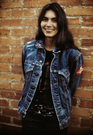 Woman brick wall jean jacket - 1 9 7 0 s free wallpaper for mobile