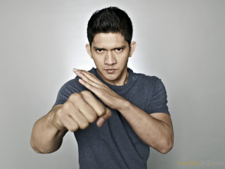 Man fist gesture hands air - a gray background behind free wallpaper