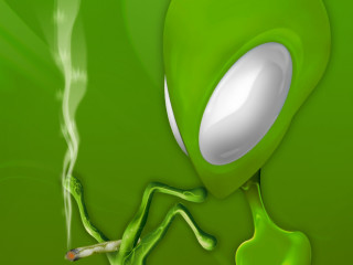 Green alien cigarette holder smoking - a green alien free wallpaper
