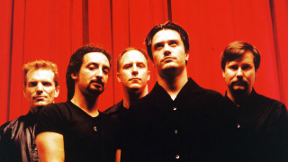 Men group red curtain standing - a red curtain free wallpaper