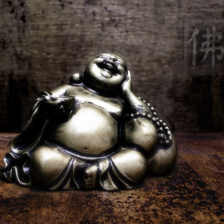 Buddha statue table brick wall - figurativism free wallpaper for tablet
