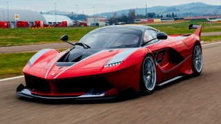 Red sports car driving road 10 - a red sports car free wallpaper