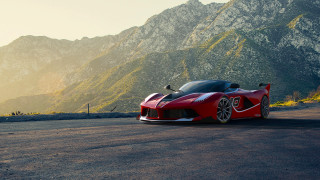 Red sports car mountain range 2 - a red sports car free wallpaper