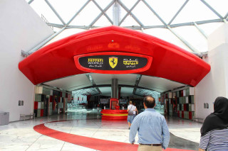 Man woman ferrari museum entrance - open ceiling free wallpaper for desktop