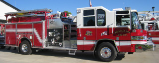 Fire truck parking lot building - a fire truck free wallpaper