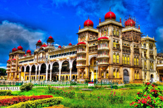 Large building red domes green 3 - a green lawn in front free wallpaper