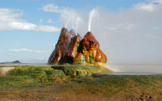 Geyser mountain range blue sky - high saturation free wallpaper