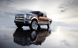 Truck parked reflective surface sky - reflective free wallpaper