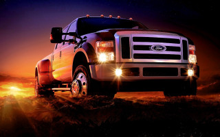 Truck lights field night sky - a bright sun free wallpaper