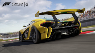 Yellow sports car race track 10 - the stand behind free wallpaper for desktop