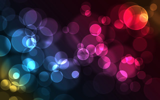 Blurry colorful light bokeh hologram - a blurry image free wallpaper