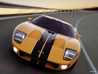 Yellow sports car sunset road - a black stripe free wallpaper